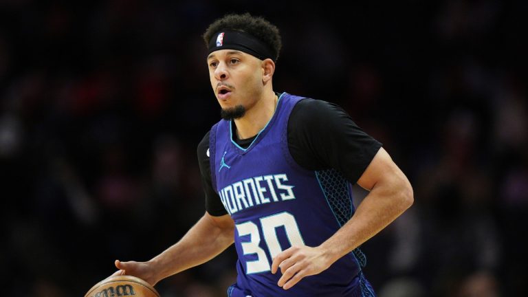 Charlotte Hornets guard Seth Curry (30) brings the ball up court against the Memphis Grizzlies during the second half of an NBA basketball game Tuesday, April 8, 2025, in Charlotte, N.C. (Jacob Kupferman/AP)