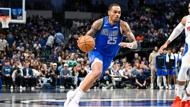 Dallas Mavericks forward P.J. Washington drives in during an NBA basketball game against the Detroit Pistons, Friday, March 21, 2025, in Dallas, Texas. (Albert Pena/AP)