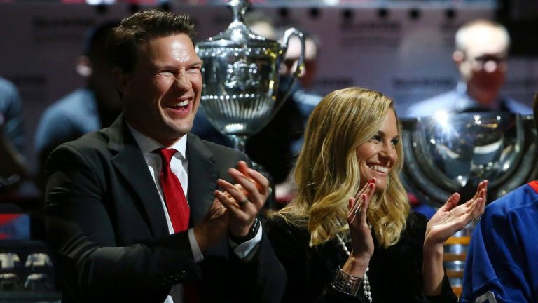 The Arizona Coyotes team honours Shane Doan, left, with his wife Andrea, during a jersey retirement ceremony prior to an NHL hockey game against the Winnipeg Jets Sunday, Feb. 24, 2019, in Glendale, Ariz. (Ross D. Franklin/AP)