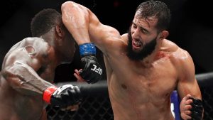 Dominick Reyes, right, hits Ovince Saint Preux with an elbow during a mixed martial arts bout at a UFC event in Las Vegas. (John Locher/AP)