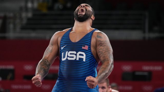 Gable-Steveson-celebrates-after-defeating-Georgia's-Gennadij-Cudinovic-during-their-men's-freestyle-125kg-wrestling-final-match-at-the-2020-Summer-Olympics