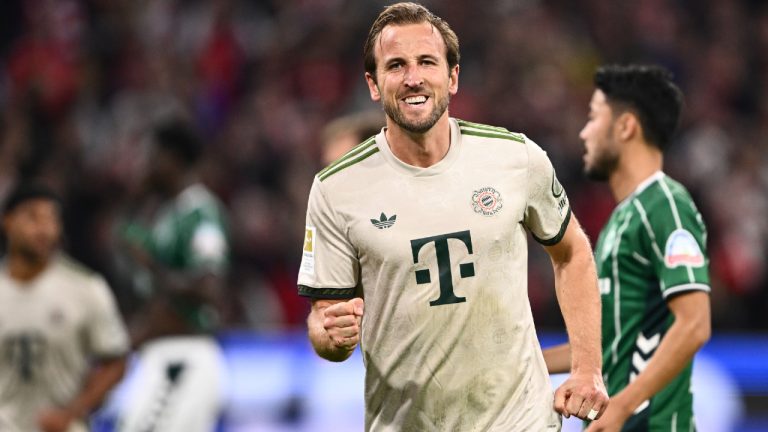 Bayern's Harry Kane celebrates scoring from the penalty spot during the Bundesliga soccer match between Bayern Munich and Werder Bremen at the Allianz Arena in Munich, Germany, Friday, Sept. 26, 2025. (Harry Langer/dpa via AP)
