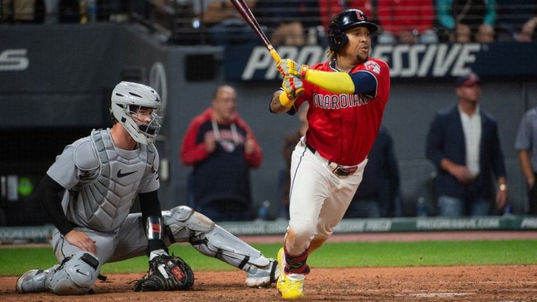 Cleveland Guardians' Jose Ramirez, right, watches his two-run RBI double off Detroit Tigers relief pitcher Will Vest as catcher Dillon Dingler, left, looks on during the seventh inning of a baseball game, Wednesday, Sept. 24, 2025, in Cleveland. (Phil Long/AP)
