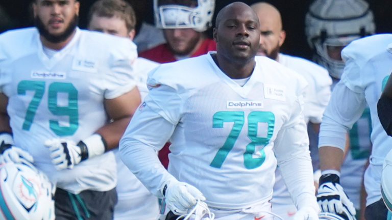 Miami Dolphins guard James Daniels (78) runs onto the field during practice at the NFL football team's training camp, Saturday, July 26, 2025, in Miami Gardens, Fla. (Lynne Sladky/AP)