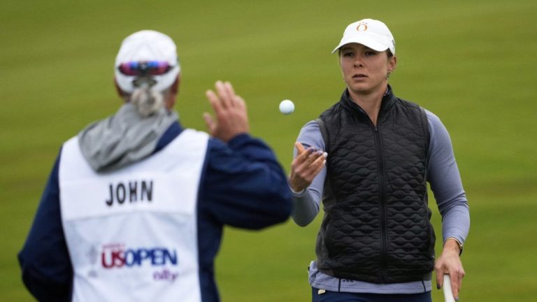 Leah John, of Canada, tosses a ball to her caddie during the first round of the U.S. Women's Open golf tournament at Erin Hills Thursday, May 29, 2025, in Erin, Wisc. (Matt York/AP)
