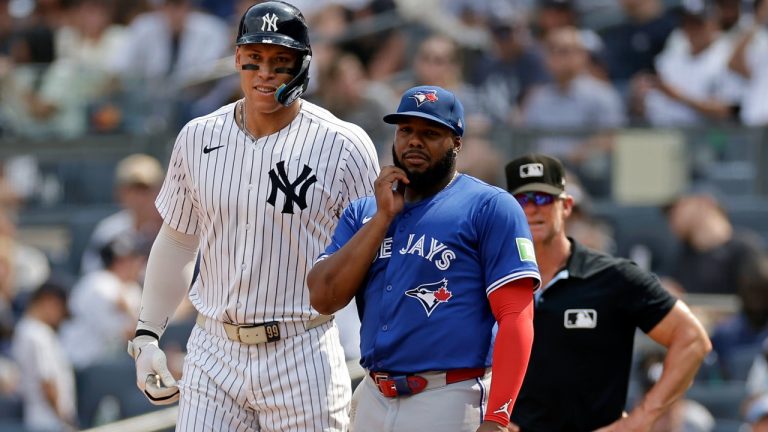 New York Yankees' Aaron Judge talks with Toronto Blue Jays first baseman Vladimir Guerrero Jr. during the third inning of a baseball game Saturday, Sept. 6, 2025, in New York. (Adam Hunger/AP)