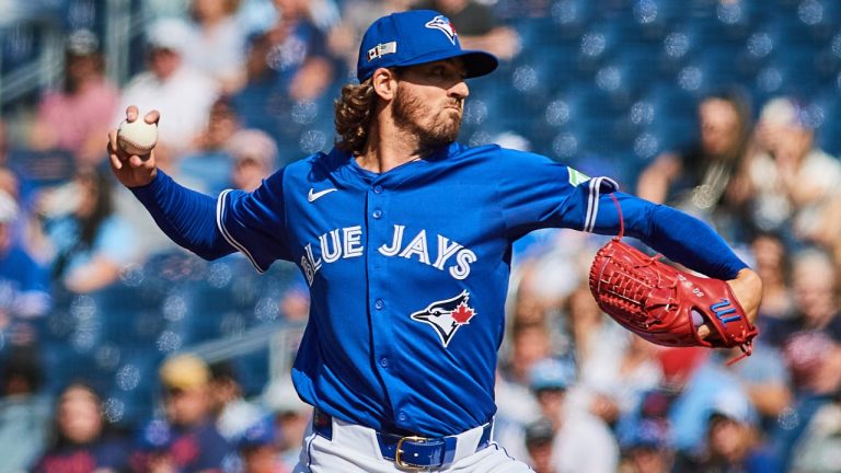 Toronto Blue Jays pitcher Kevin Gausman (34) works against the Houston Astros during first inning MLB baseball action in Toronto, on Thursday, Sept. 11, 2025. THE CANADIAN PRESS/Sammy Kogan