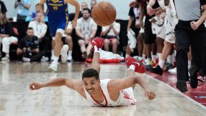 Toronto Raptors' Tyreke Key falls to the floor against the Golden State Warriors during the first half of a NBA summer league basketball game Thursday, July 17, 2025, in Las Vegas. (John Locher/AP)