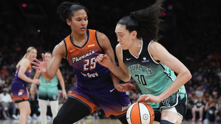 New York Liberty forward Breanna Stewart (30) drives on Phoenix Mercury forward Alyssa Thomas (25) during the second half of Game 3 in the first round of the WNBA basketball playoffs, Friday, Sept. 19, 2025, in Phoenix. (Rick Scuteri/AP)