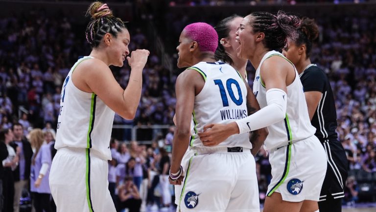From left, Minnesota Lynx's Kayla McBride, Courtney Williams and Napheesa Collier celebrate after the team's victory over the Golden State Valkyries in the first round of the WNBA basketball playoffs Wednesday, Sept. 17, 2025, in San Jose, Calif. (Godofredo A. Vásquez/AP)