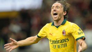 AC Milan's Luka Modric celebrates after scoring his side's opening goal during a Serie A soccer match between AC Milan and Bologna at San Siro stadium in Milan, Italy, Sunday, Sept. 14, 2025. (Luca Bruno/AP)