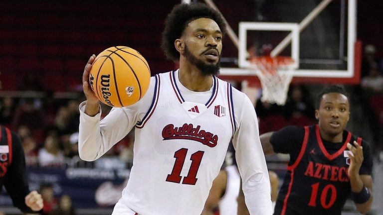 Fresno State's Mykell Robinson drives against San Diego State during the second half of an NCAA college basketball game in Fresno, Calif., Wednesday, Dec. 4, 2024. (Gary Kazanjian/AP)