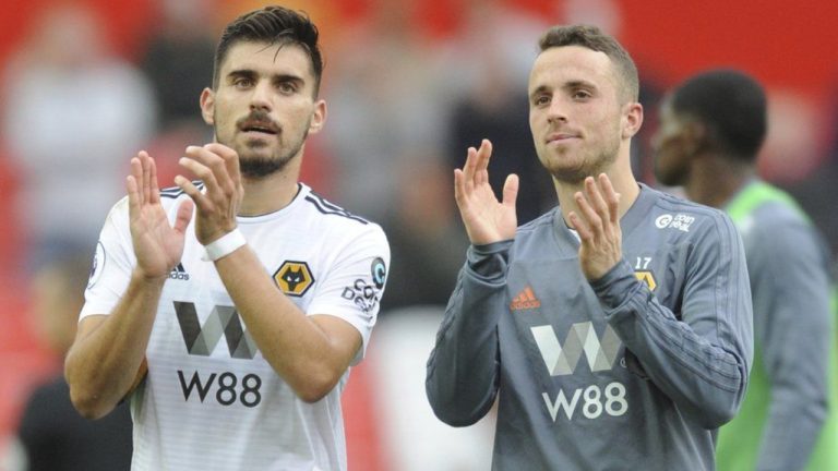 Ruben Neves, left, and Diogo Jota during the English Premier League soccer match between Manchester United and Wolverhampton Wanderers at Old Trafford stadium in Manchester, England, Saturday, Sept. 22, 2018. (Rui Vieira/AP)
