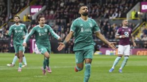 Liverpool's Mohamed Salah celebrates after scoring from a penalty kick during the Premier League soccer match between Burnley and Liverpool in Burnley, England, Sunday, Sept. 14, 2025. (Jon Super/AP)