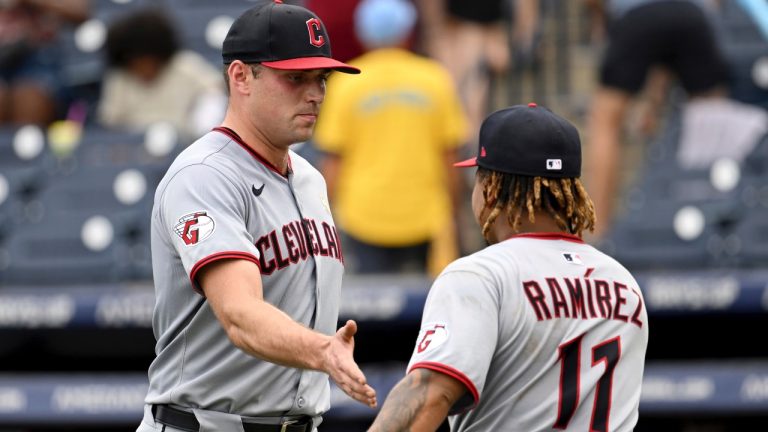 Cleveland Guardians pitcher Cade Smith, left, and José Ramírez celebrate after their win over the Tampa Bay Rays in a baseball game Sunday, Sept. 7, 2025, in Tampa, Fla. (AP/Jason Behnken)