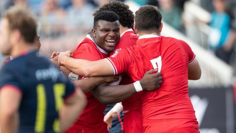 Canada's Matthew Oworu (left) and Lucas Rumball (7) celebrate a try against Spain during second half men's rugby action in Edmonton, on Friday July 18, 2025. (Jason Franson/CP)
