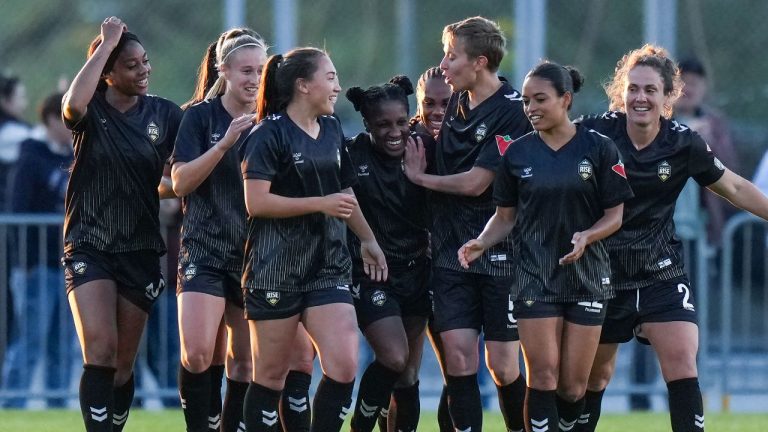 Vancouver Rise's Jasmyne Spencer, centre, celebrates with her teammates after scoring against the Halifax Tides during the second half of an NSL soccer match, in Burnaby, B.C., on May 5, 2025. (CP/Darryl Dyck)