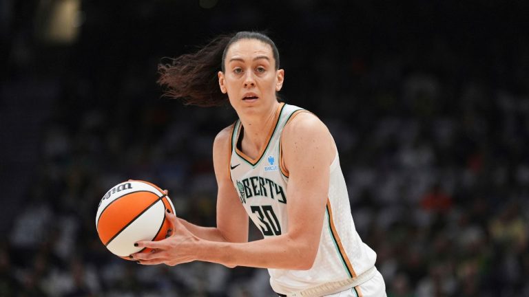 New York Liberty forward Breanna Stewart holds the ball during a WNBA basketball game against the Seattle Storm, June 22, 2025, in Seattle. (AP/Lindsey Wasson)
