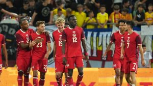 Canada's Niko Sigur, second from left, celebrates after scoring his side's third goal during an international friendly soccer match between Romania and Canada at the National Arena stadium in Bucharest, Romania, Sept. 5, 2025. (Andreea Alexandru/AP)