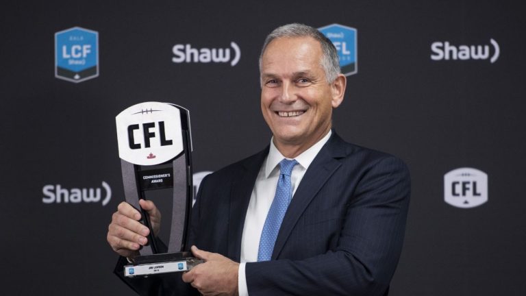 Jim Lawson poses with the trophy for the 2019 Commissioner's Award at the CFL Awards during the CFL's Grey Cup week in Calgary, Thursday, Nov. 21, 2019 (Nathan Denette/CP)