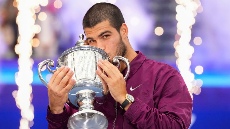 Carlos Alcaraz, of Spain, kisses the championship trophy after defeating Jannik Sinner, of Italy, in the men's singles final of the U.S. Open tennis championships, Sept. 7, 2025, in New York. (Kirsty Wigglesworth/AP Photo)