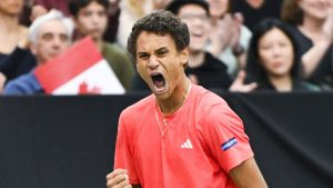 Gabriel Diallo, of Canada, reacts during his Davis Cup qualifying tennis match against Fabian Marozsan, of Hungary, in Montreal on, February 2, 2025. CP/Graham Hughes