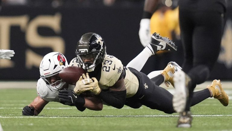 New Orleans Saints safety Julian Blackmon (23) is unable to intercept a pass intended for Arizona Cardinals tight end Trey McBride during the second half of an NFL football game Sunday, Sept. 7, 2025, in New Orleans. (Gerald Herbert/AP)
