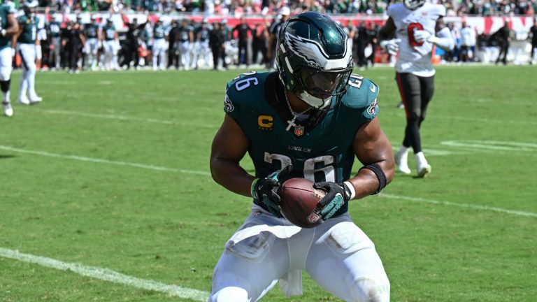 Philadelphia Eagles running back Saquon Barkley scores a touchdown during the second half of an NFL game against the Tampa Bay Buccaneers, Sunday, Sept. 28, 2025, in Tampa, Fla. (AP/Jason Behnken)