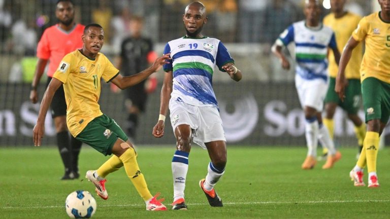 South Africa Relebohile Mofokeng, front left, challenges Lesotho Lehlohonolo Matsau, front right, during the World Cup qualifying match between South Africa and Lesotho, in Polokwane, South Africa, Friday, March 21, 2025. (AP Photo, File)