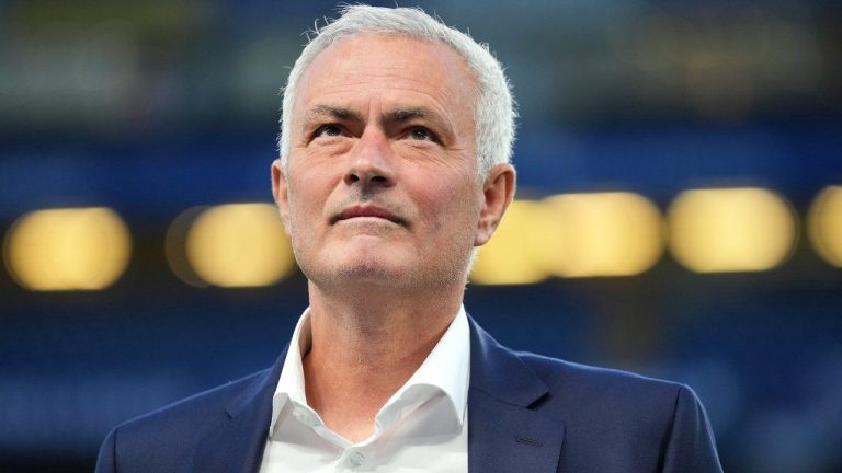Benfica's head coach Jose Mourinho gives an interview on the pitch ahead of a Champions League opening phase soccer match between Chelsea and SL Benfica at Stamford Bridge stadium in London, Tuesday, Sept. 30, 2025. (Kin Cheung/AP)