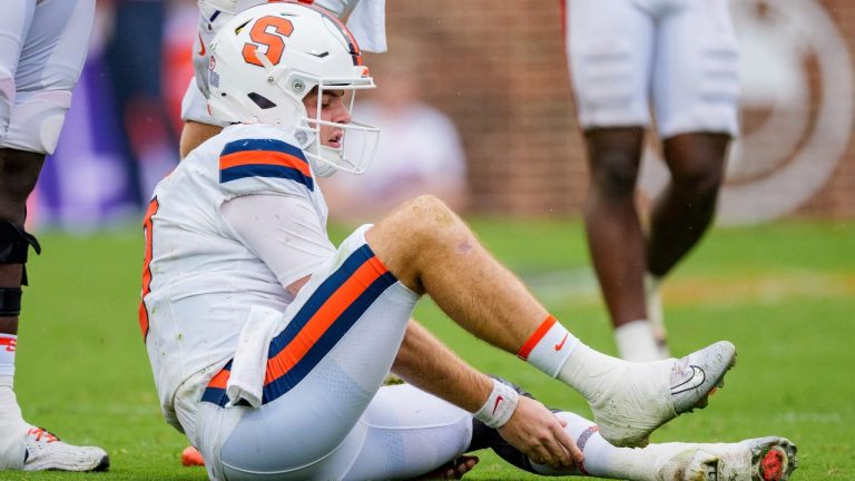 Syracuse quarterback Steve Angeli sits injured in the second half of an NCAA college football game against Clemson, Saturday, Sept. 20, 2025, in Clemson, S.C. (AP Photo/Jacob Kupferman)