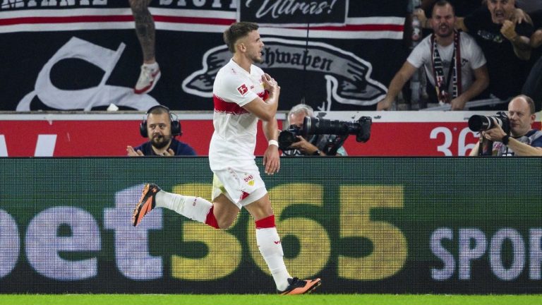 Stuttgart's Ermedin Demirovic celebrates scoring during the Bundesliga soccer match between VfB Stuttgart and FC St. Pauli, at MHPArena, Stuttgart, Germany, Friday Sept. 19, 2025. (Tom Weller/dpa via AP)