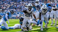 Taylor’s three TDs keeps Colts undefeated with thumping of winless Titans