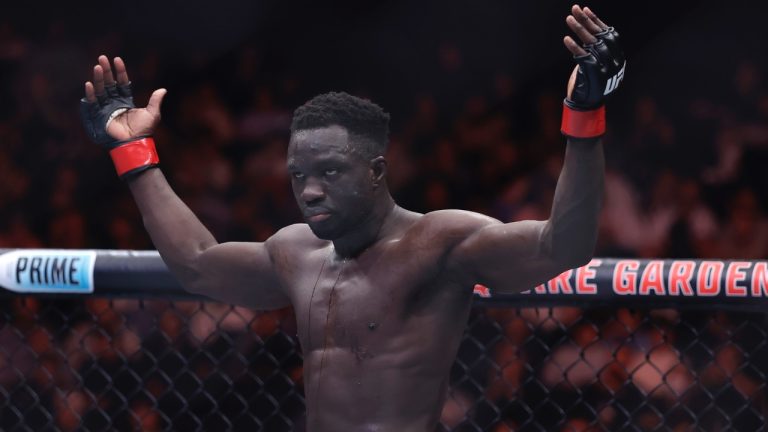 Uganda's David Onama gestures during a UFC bout. (Adam Hunger/AP)
