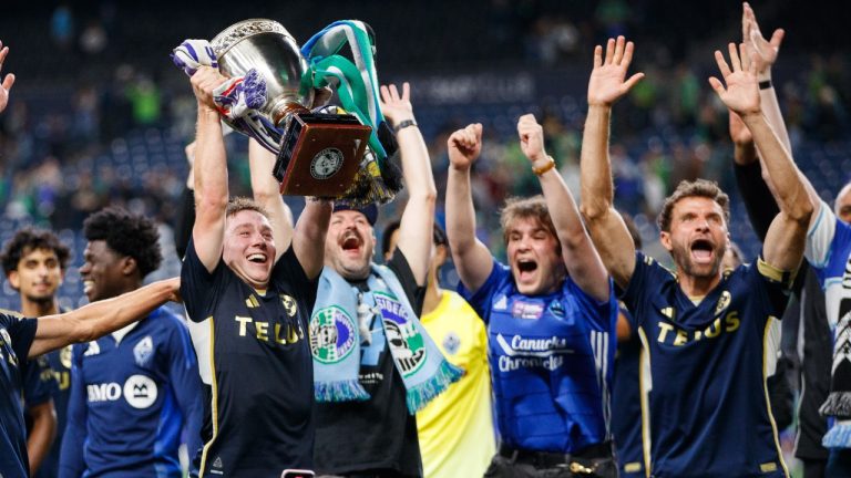 Vancouver Whitecaps FC defender Tate Johnson celebrates securing a record-eighth Cascadia Cup title after an MLS soccer match against Seattle Sounders FC on Saturday, Sept. 27, 2025, in Seattle. (Kevin Ng/AP)