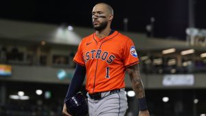 Houston Astros' Carlos Correa walks towards the dugout at the end of a baseball game after the team lost to the Athletics, Wednesday, Sept. 24, 2025, in West Sacramento, Calif. (Scott Marshall/AP Photo)