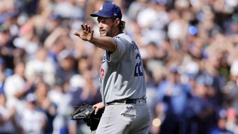 Los Angeles Dodgers pitcher Clayton Kershaw waves as he leaves during the sixth inning of a baseball game against the Seattle Mariners, Sunday, Sept. 28, 2025, in Seattle. (John Froschauer/AP)
