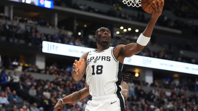San Antonio Spurs centre Bismack Biyombo (18) in the second half of an NBA basketball game Wednesday, April 2, 2025, in Denver. (David Zalubowski/AP)