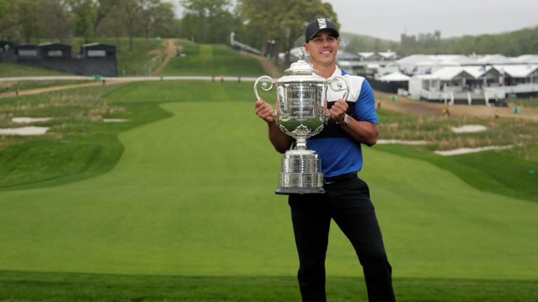 Brooks Koepka poses with the Wanamaker Trophy after winning the PGA Championship golf tournament, Sunday, May 19, 2019, at Bethpage Black in Farmingdale, N.Y. (Julio Cortez/AP)