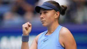 Amanda Anisimova, of the United States, reacts after scoring a point against Iga Swiatek, of Poland, during the quarterfinal round of the US Open tennis championships, Wednesday, Sept. 3, 2025, in New York. (Yuki Iwamura/AP)