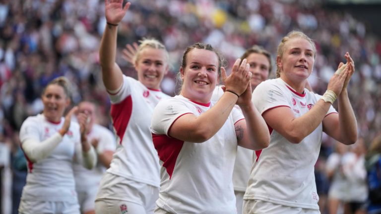 England players celebrate after defeating France during the Women's Rugby World Cup 2025 semifinal match between France and England in Bristol, England, Saturday, Sept. 20, 2025.(Alastair Grant/AP)
