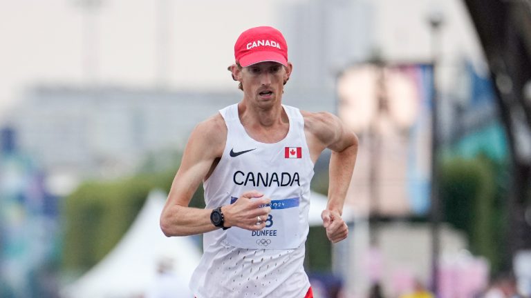 Canada's Evan Dunfee leads the pack during the marathon race walk relay mixed at the 2024 Summer Olympics, Wednesday, Aug. 7, 2024, in Paris, France. (CP/AP/Vadim Ghirda)