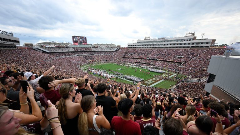Florida State players run onto the field before the start of an NCAA college football game against Alabama, Saturday, Aug. 30, 2025, in Tallahassee, Fla. (Phelan M. Ebenhack/AP)