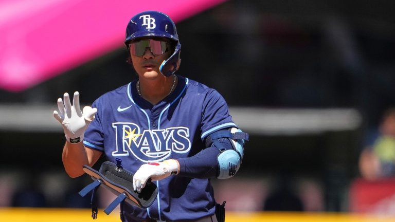 Tampa Bay Rays' Ha-Seong Kim reacts after hitting an RBI double against the Seattle Mariners during the second inning of a baseball game Sunday, Aug. 10, 2025, in Seattle. (Lindsey Wasson/AP)