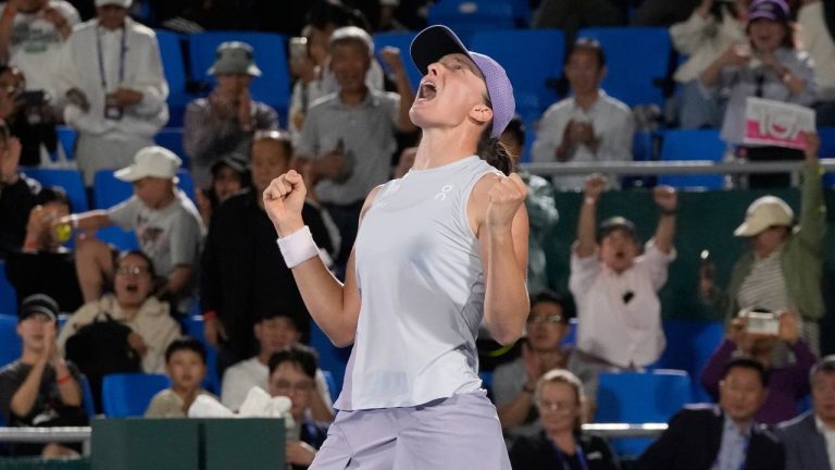 Iga Swiatek of Poland reacts after winning against Ekaterina Alexandrova of Russia during the final match of the Korea Open tennis championships at Seoul Olympic Park Tennis Center in Seoul, South Korea, Sunday, Sept. 21, 2025. (Ahn Young-joon/AP)