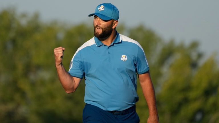 Europe's Jon Rahm celebrates after his putt on the third green during his morning Foursome match at the Ryder Cup golf tournament at the Marco Simone Golf Club in Guidonia Montecelio, Italy, Friday, Sept. 29, 2023. (Alessandra Tarantino/AP)