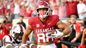 Arkansas tight end Rohan Jones (88) slips past Arkansas State defensive back AG McGhee (6) to score a touchdown during an NCAA football game on Saturday, Sept. 6, 2025, in Little Rock, Ark. (Michael Woods/AP Photo)