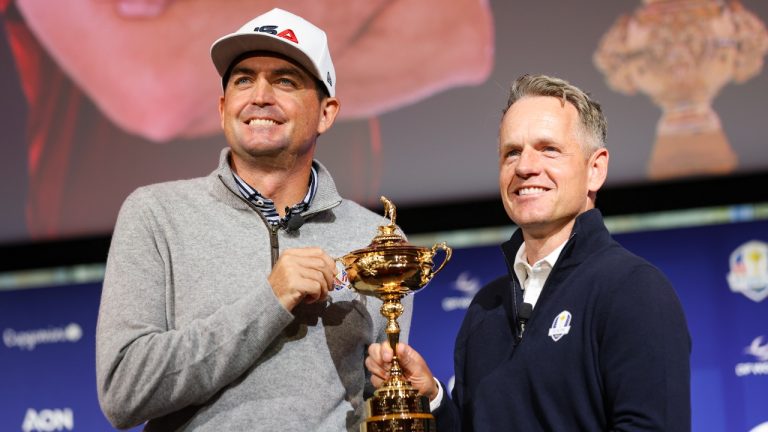 U.S. Ryder Cup team captain Keegan Bradley, left, and Europe team captain Luke Donald pose for a photo with the Ryder Cup trophy after a press conference in New York, Tuesday, Oct. 8, 2024, in New York. (Heather Khalifa/AP)