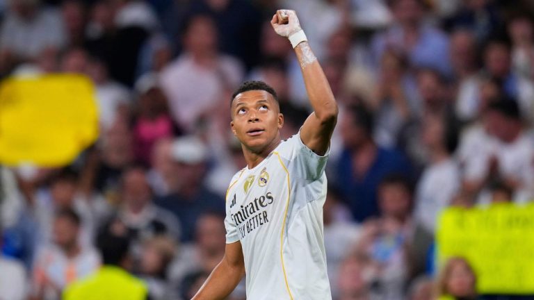 Real Madrid's Kylian Mbappe celebrates after scoring his side's second goal during a Champions League opening phase soccer match between Real Madrid and Marseille at Santiago Bernabeu stadium, in Madrid, Tuesday, Sept. 16, 2025. (Manu Fernandez/AP Photo)