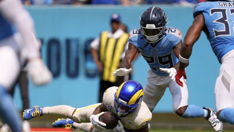 Los Angeles Rams running back Kyren Williams, below, makes a catch before being tackled by Tennessee Titans cornerback Jarvis Brownlee Jr. during the second half of an NFL football game Sunday, Sept. 14, 2025, in Nashville, Tenn. (George Walker IV/AP)